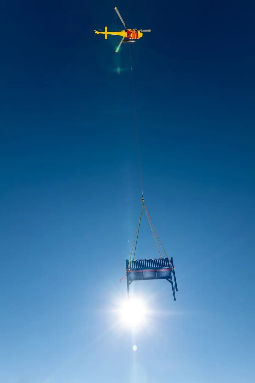 A 700kg blue bench appears out of the sky in St. Moritz